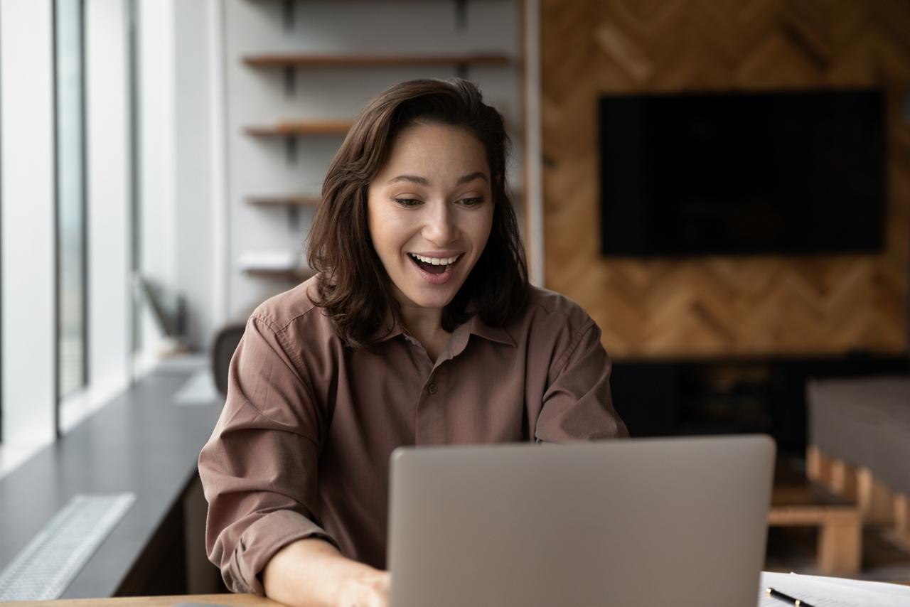 smiling woman with laptop