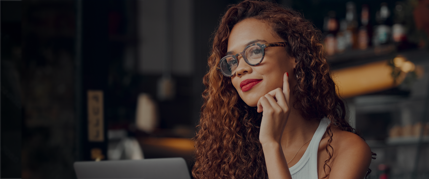 woman smiling on laptop
