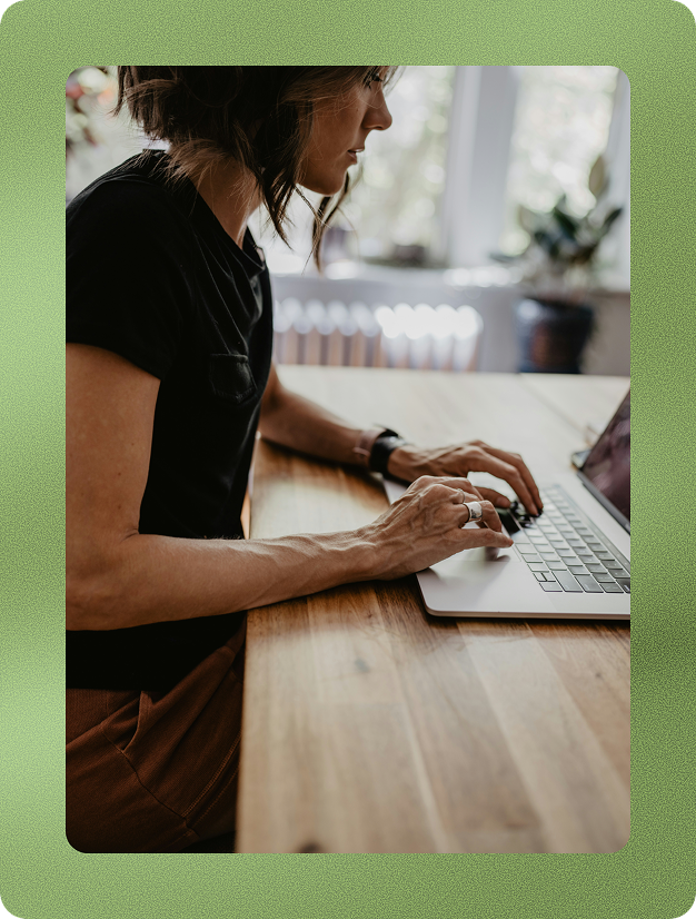 Image of woman working on laptop
