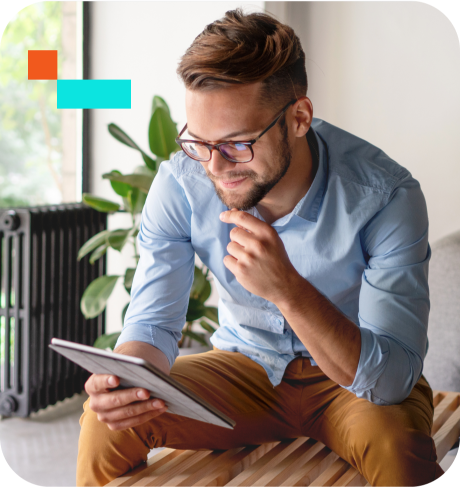 man looking at tablet