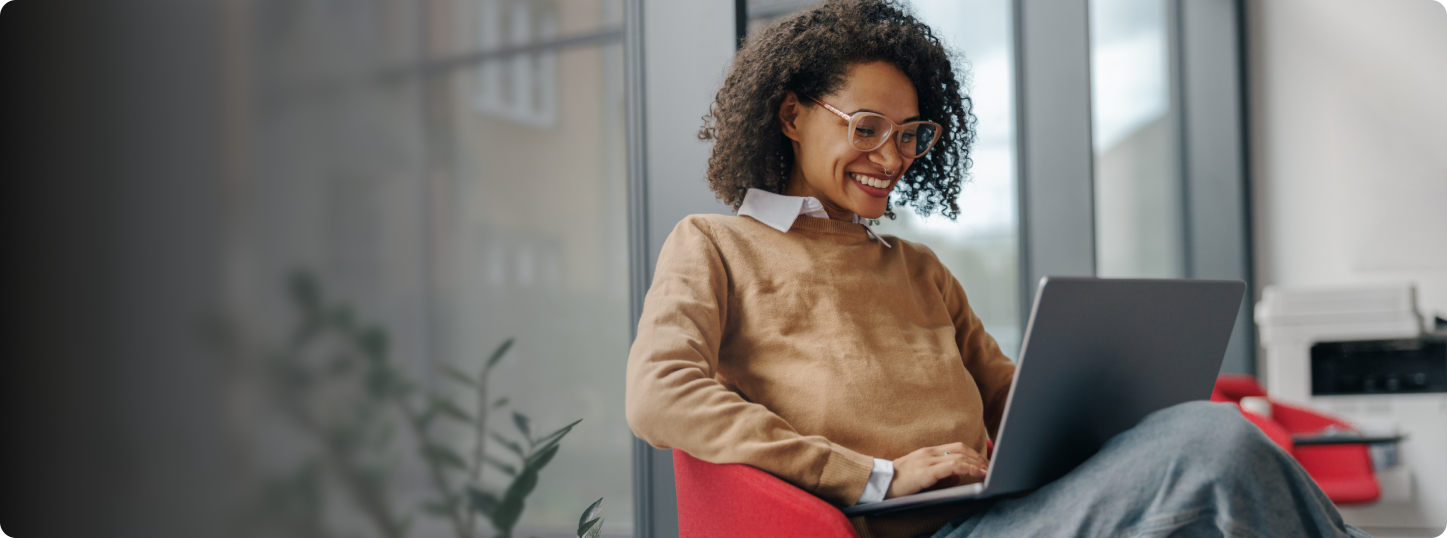 Smiling woman in laptop