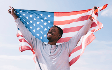 man holding US flag