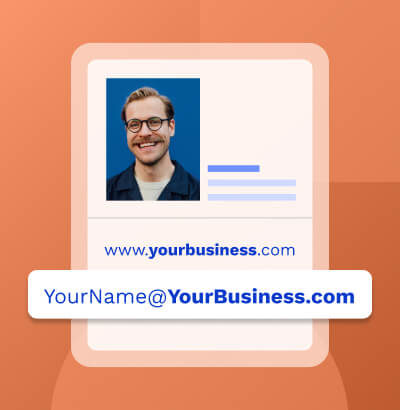 Image displaying smiling man showing a professional email, domain name and hosting