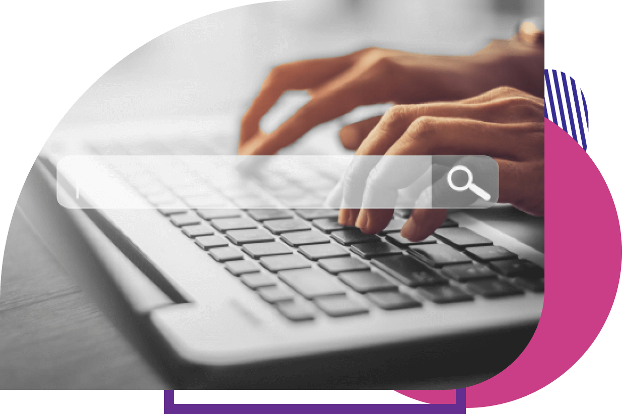 View of someone’s hands working on a laptop with a ghost search bar in the center of the image 