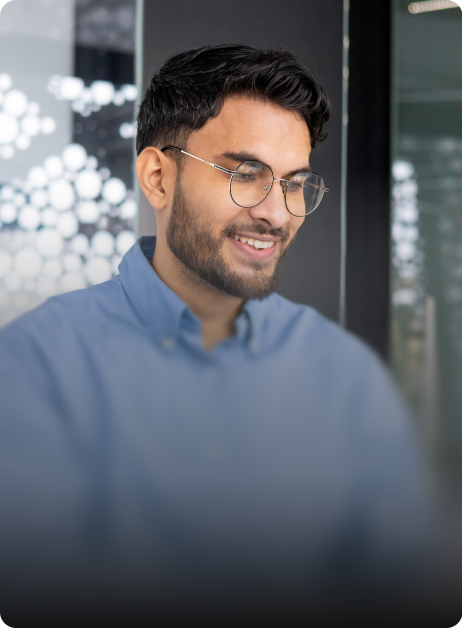man with glasses smiling