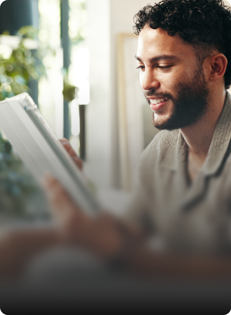 man looking at tablet