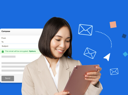 Woman holding a laptop comparing email hosting plans